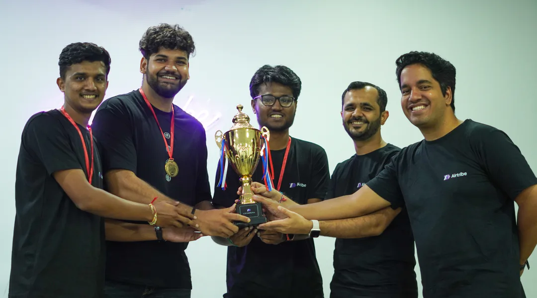Winning team with the hackathon trophy